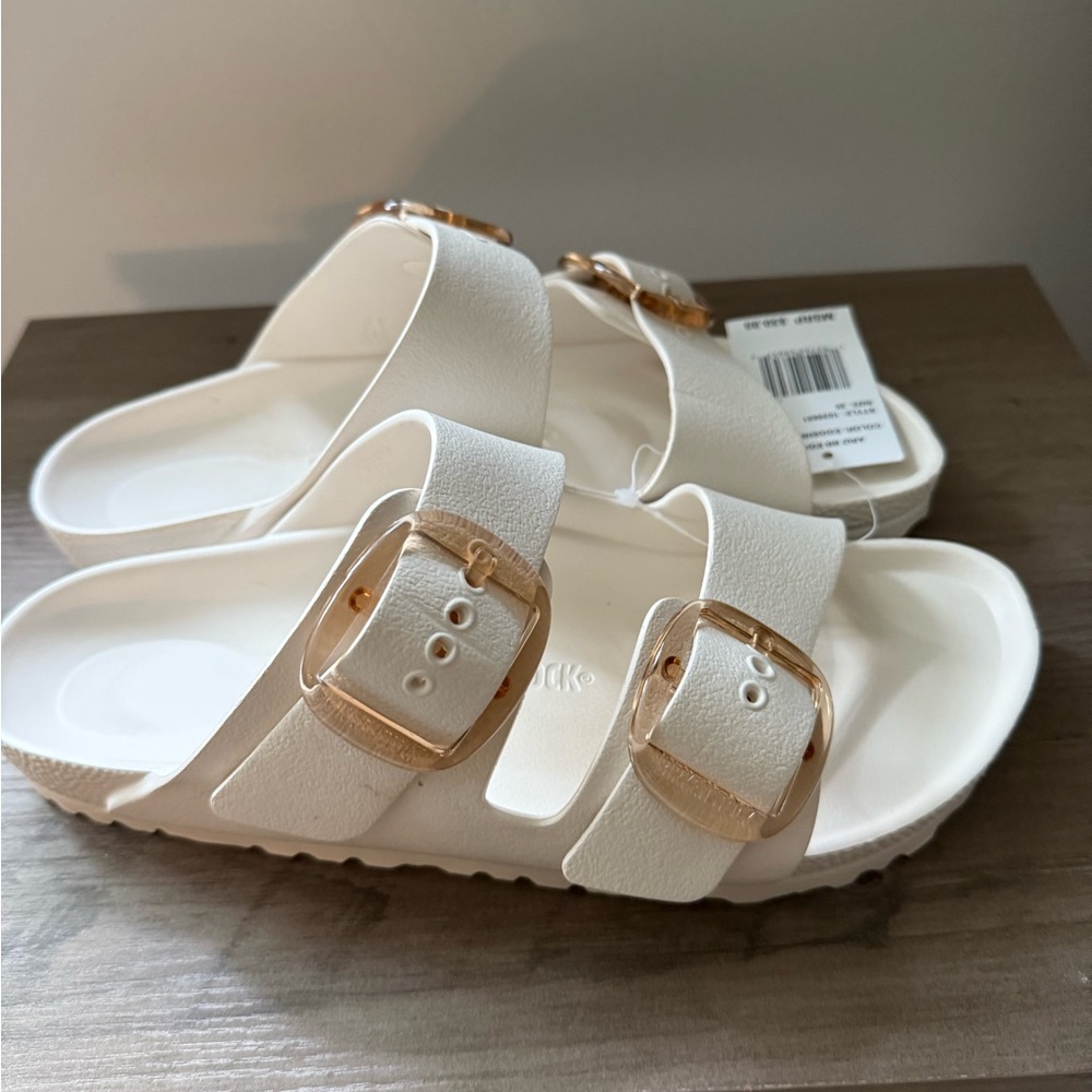 Birkenstock White Sandals with Gold Buckles